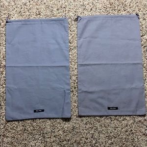 2 Miu Miu dustbag shoe covers